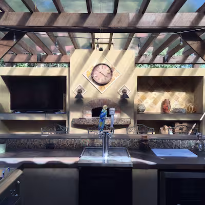 A beautiful outdoor kitchen with all the necessary appliances to cook increasable meals in the great Alberta outdoors.